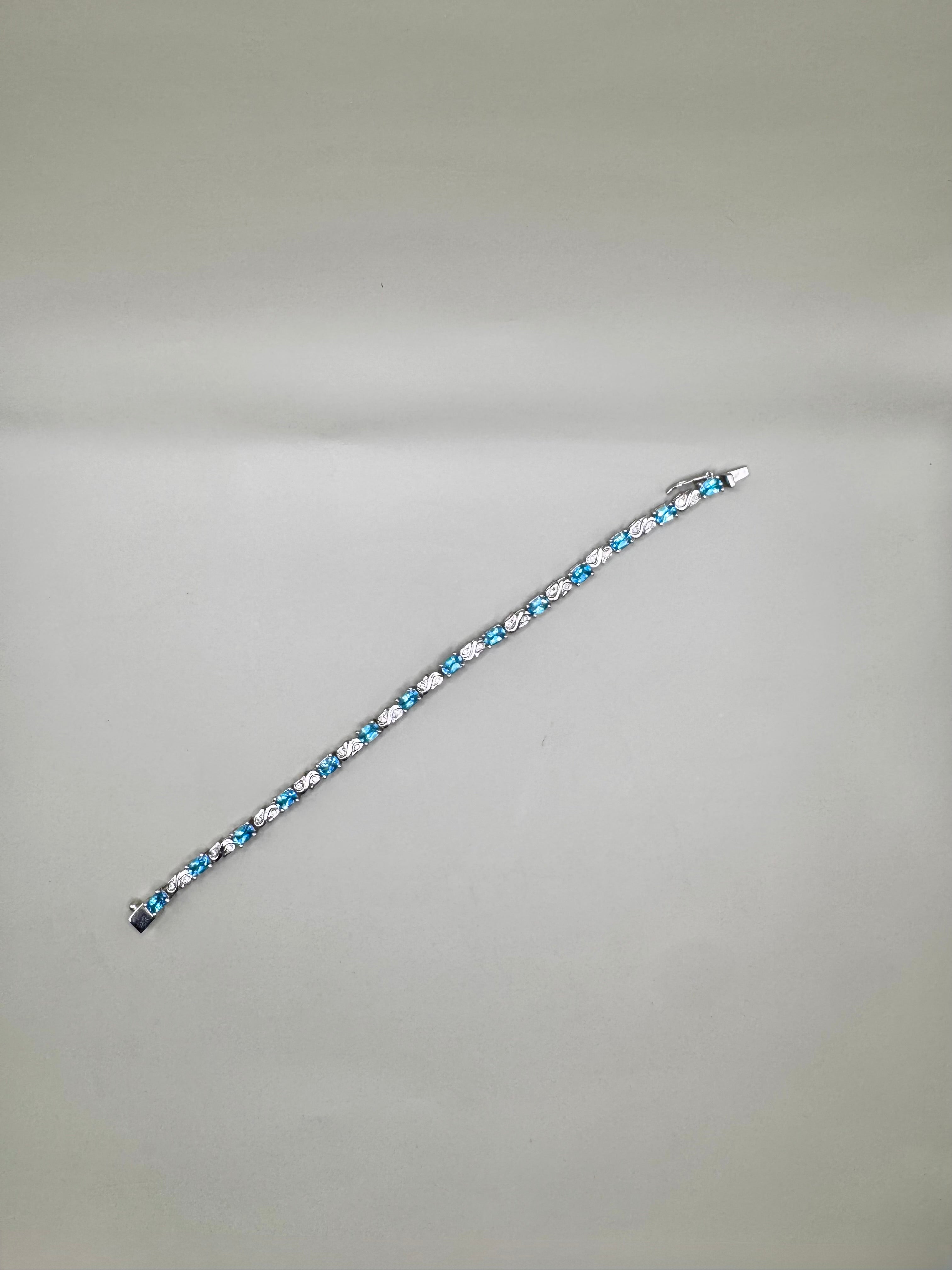 BLUE TOPAZ AND CLEAR QUARTZ BRACELET