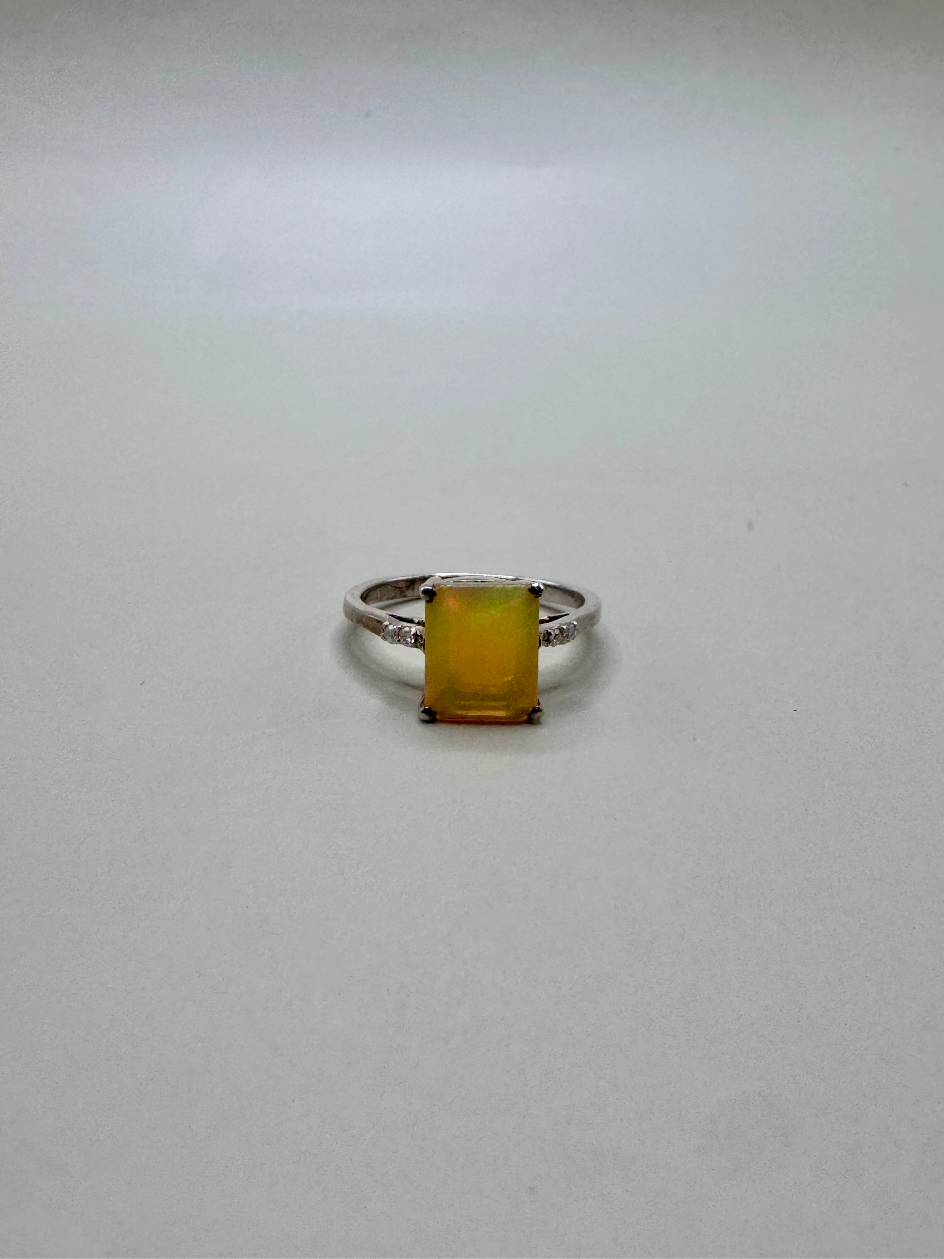 FIRE OPAL SQUARE CUT AND DIAMONDS RING
