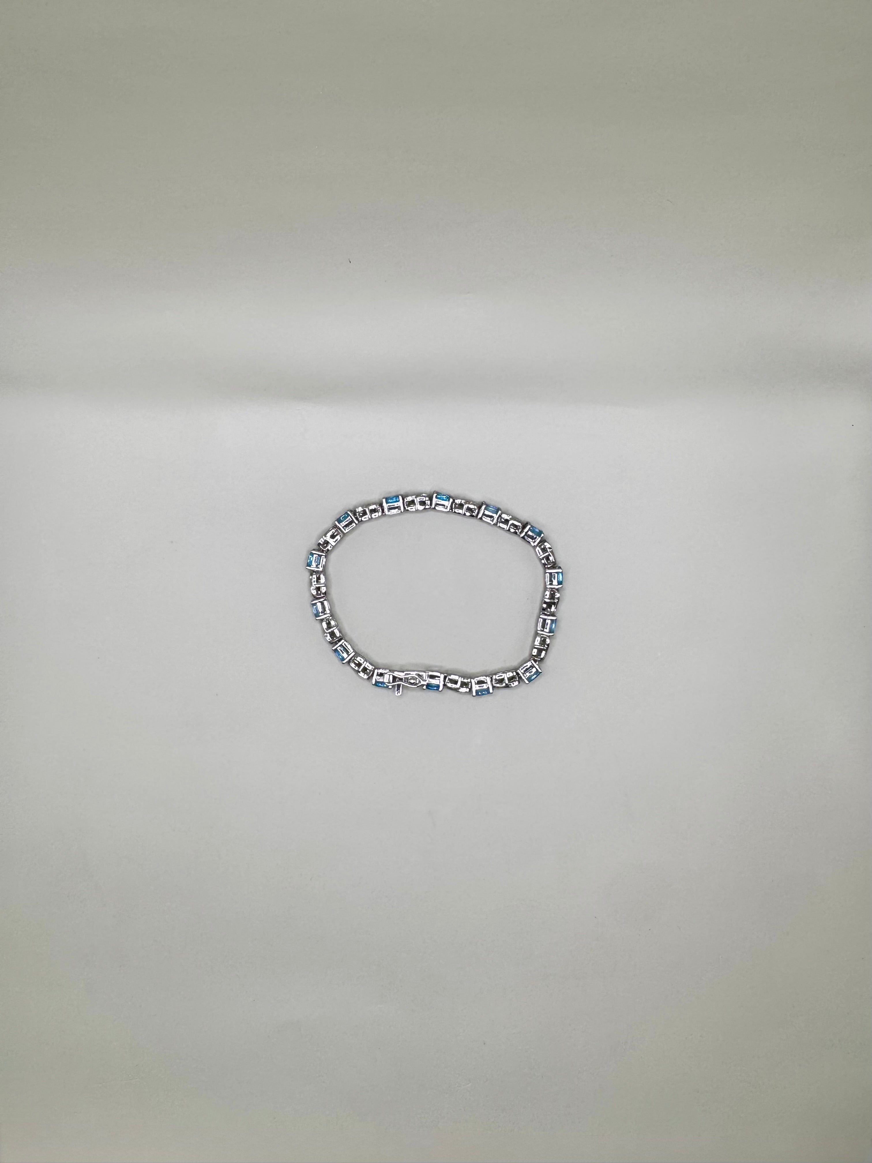 BLUE TOPAZ AND CLEAR QUARTZ BRACELET