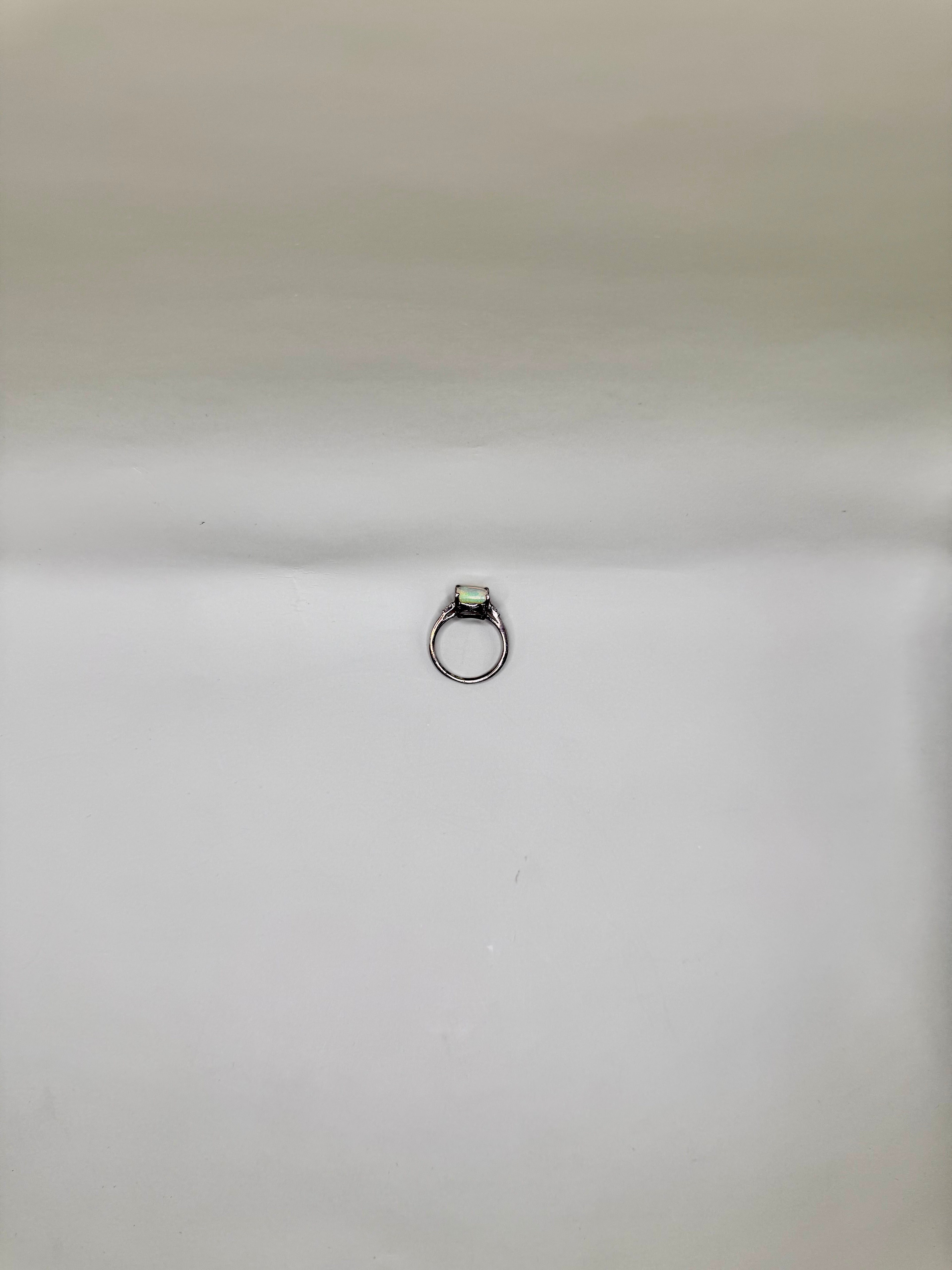 FIRE OPAL SQUARE CUT AND DIAMONDS RING