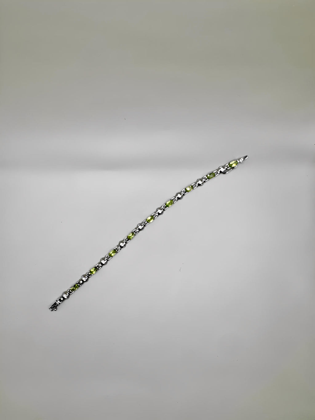 PERIDOT AND CLEAR QUARTZ BRACELET