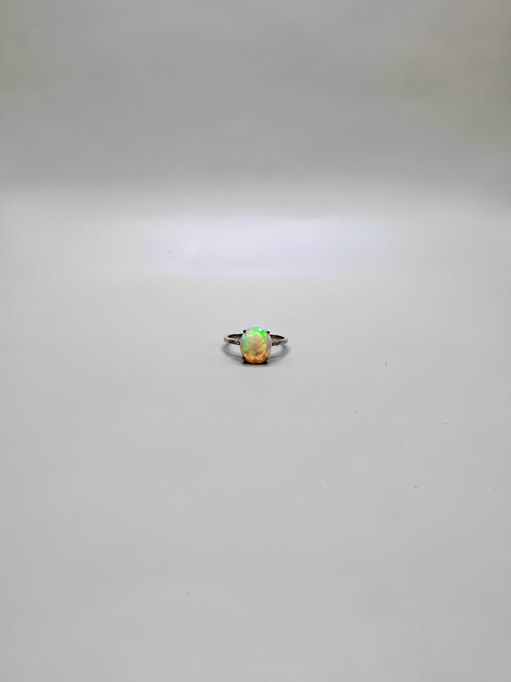 FIRE OPAL PEAR CUT AND DIAMONDS RING