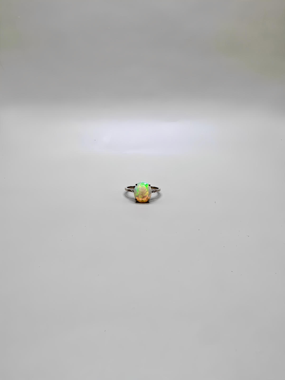 FIRE OPAL PEAR CUT AND DIAMONDS RING